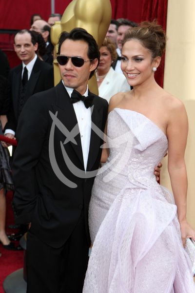 Marc Anthony y Jennifer Lopez con Oscar