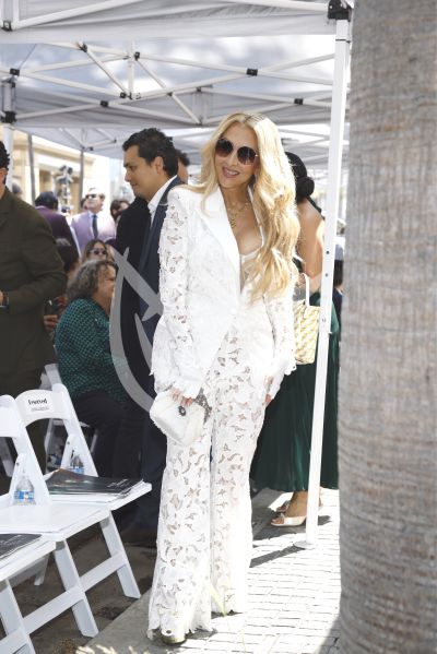 Marco Antonio Solís y esposa con Estrella