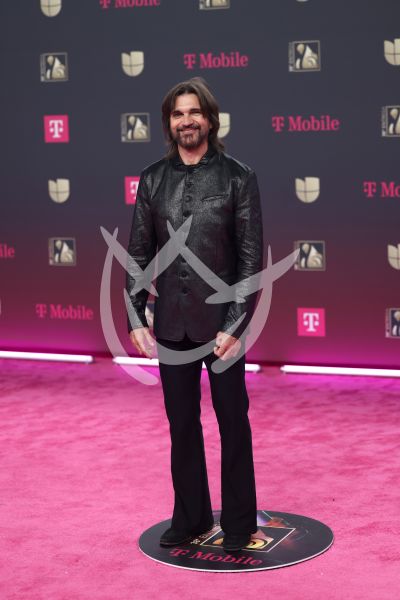 Juanes en familia en PLN