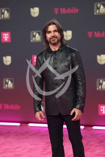 Juanes en familia en PLN