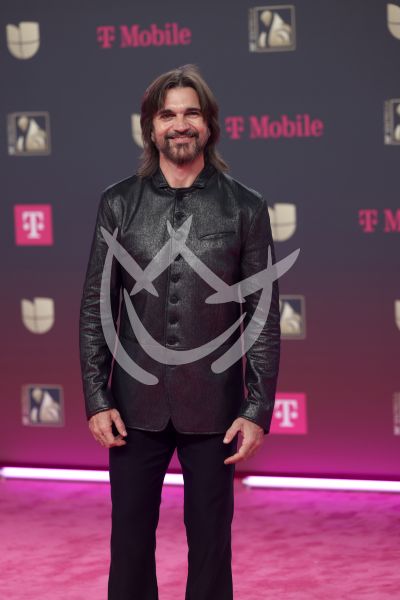 Juanes en familia en PLN